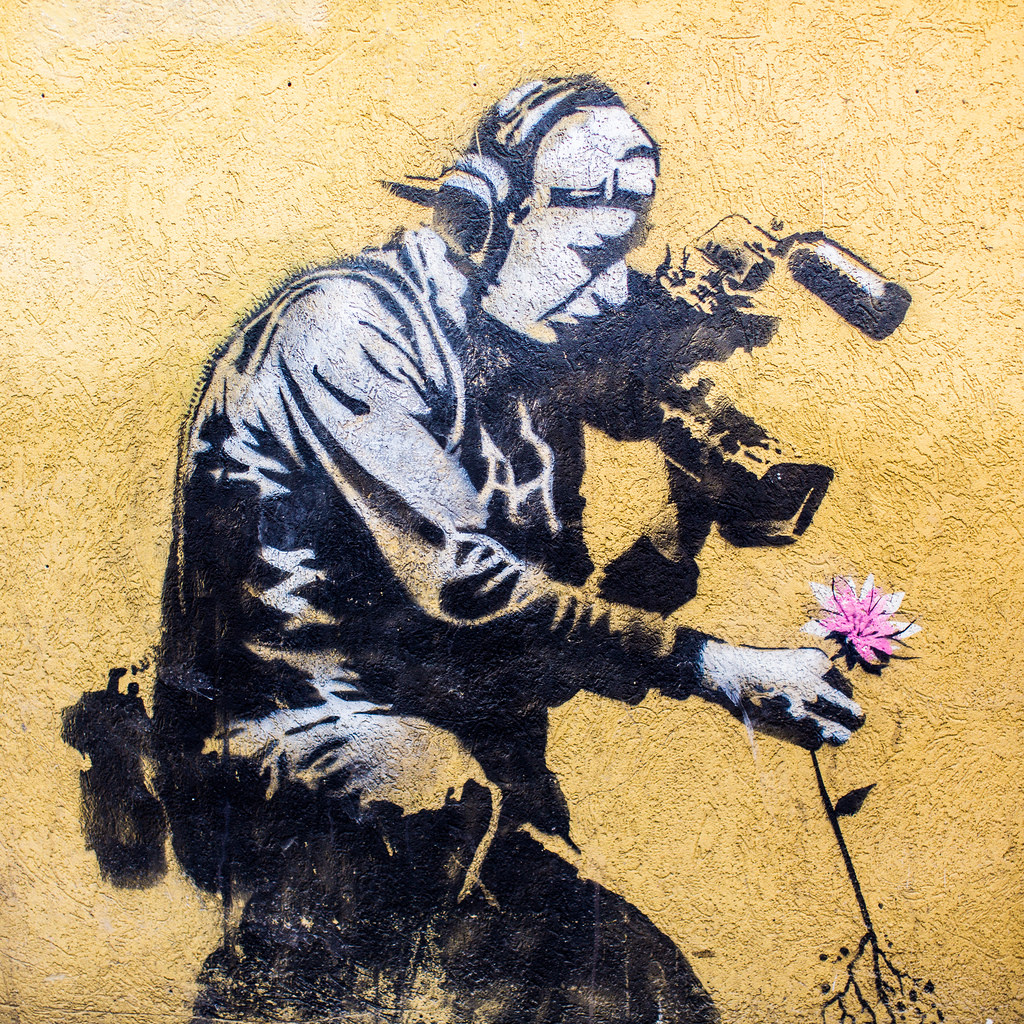 Banksy's 'Cameraman and Flower'